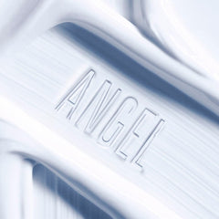 Mugler Angel cream texture close-up showing rich, nourishing creamy consistency