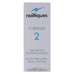 Nailtiques brush applying protein to nail plate close-up demonstrating quick, precise application