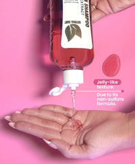 Natural Sant shampoo bottle close-up highlighting cleansing action
