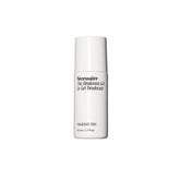 Nécessaire front bottle shot showing clean clinical design and benefit of clarity