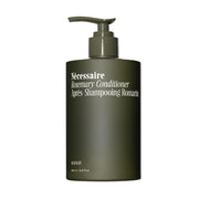Nécessaire front pump bottle showing clean label and brand clarity