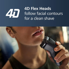Norelco side profile in hand illustrating compact travel-friendly size