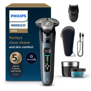 Norelco i9000 front view showing ergonomic handle and power button for confident grip