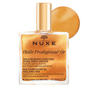 NUXE bottle front view showing shimmering oil and elegant packaging benefit glow