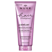 NUXE front packaging showing product and benefits for shine