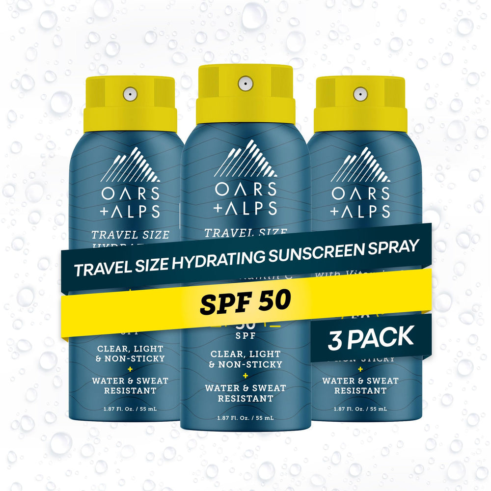 Oars + Alps front travel packaging showing three SPF 50 cans and portability benefit