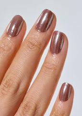 ohora close-up of brown chrome strip texture highlighting mirror shine