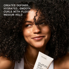 Olaplex No.10 applied to damp curls illustrating enhanced definition and reduced frizz