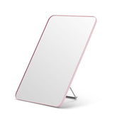 OMIRO pink desk mirror front view showing full 10x7 reflective surface and stylish finish for clear grooming