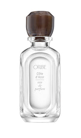 ORIBE front bottle on neutral surface showing elegant shape and travel convenience
