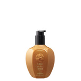 Oribe front bottle showing label and elegant packaging for luxury hand care