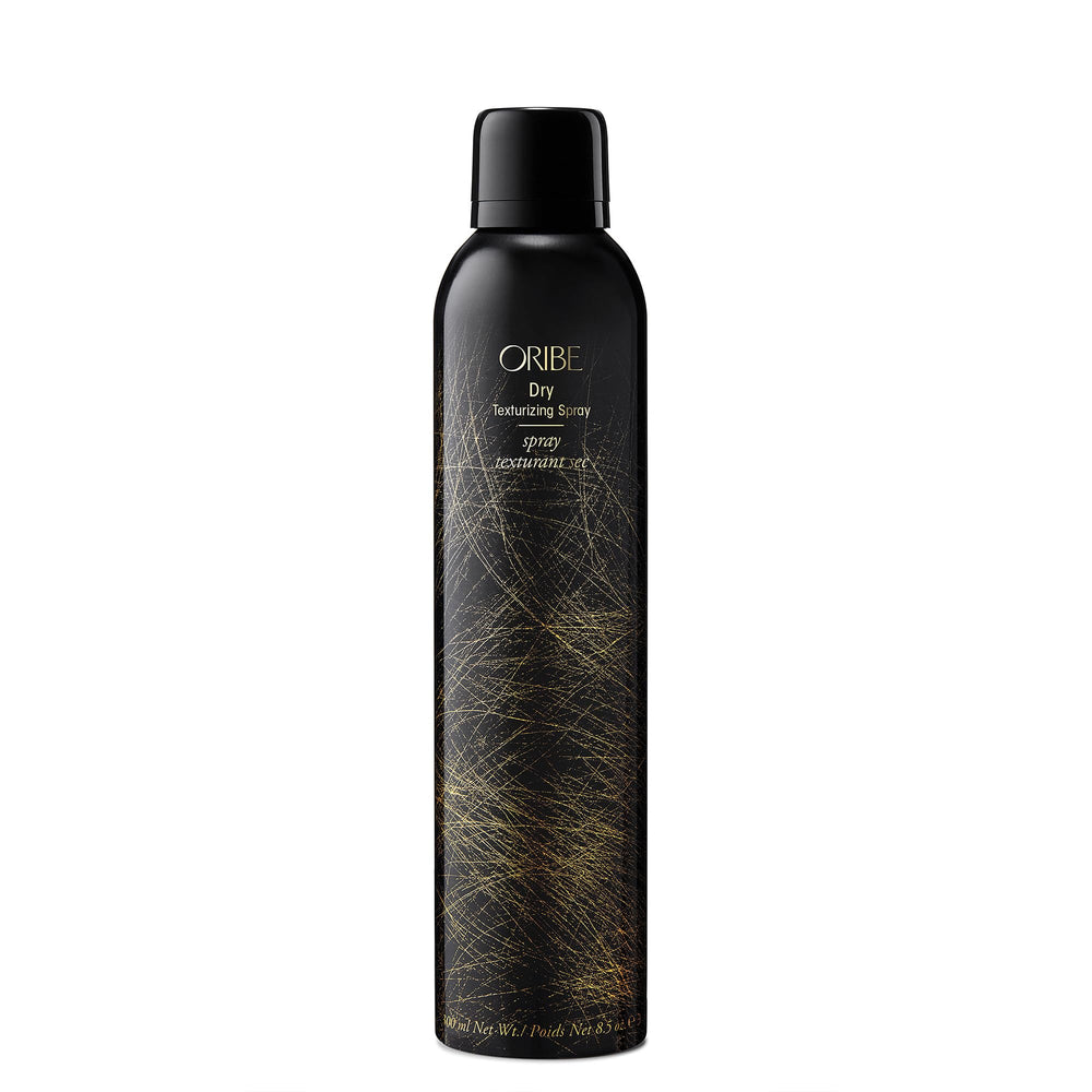 Oribe dry texturizing spray front bottle shows elegant packaging and brand prestige