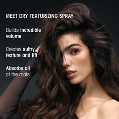 Oribe dry texturizing spray mist being sprayed illustrates even coverage and lift