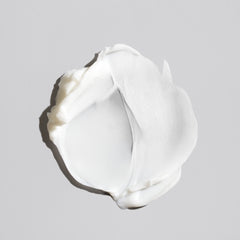 Oribe Fiber Groom in use styling short hair with natural separation and healthy-looking bounce