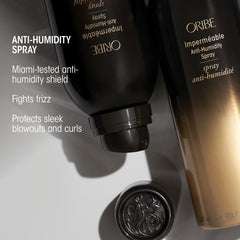 Hand holding Oribe Impermeable to show size and portability for on-the-go protection