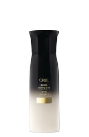 Oribe Mystify restyling spray front bottle showing sleek label and size for easy identification and shelf appeal