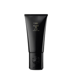 Oribe jar front view showing product and luxury branding benefit hold