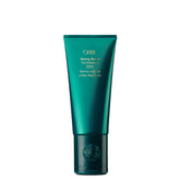 Oribe jar front view showing branding and product benefit definition