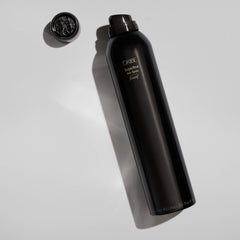 Oribe Superfine on hair close-up showing shiny-soft finish and movement