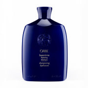 ORIBE front packaging of Supershine Hydrating Shampoo showing clean design and benefit