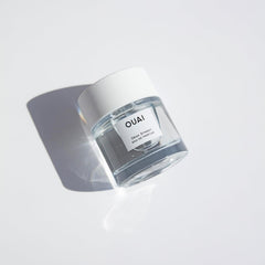 OUAI fine mist spray mid-air illustrating light texture and even coverage