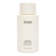 OUAI bottle front view showing clean design and product benefit