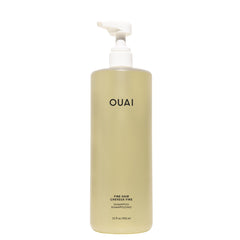 OUAI front packaging of 32oz shampoo shows salon-size convenience and visible brand