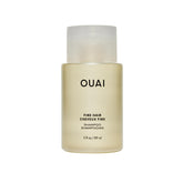 OUAI travel shampoo front packaging shows compact bottle and travel convenience