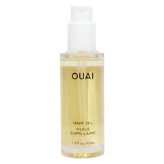 OUAI front bottle showing product and compact size for travel