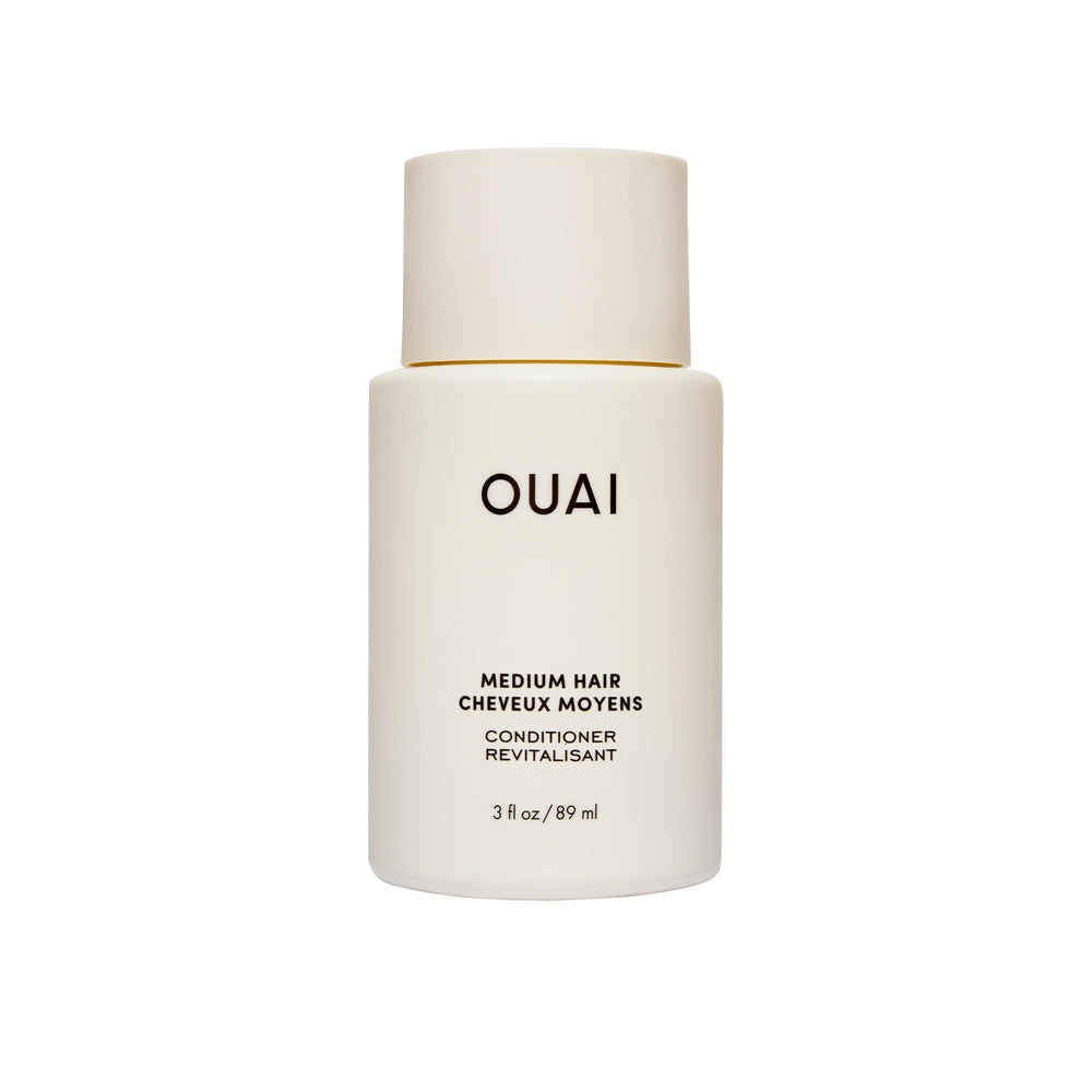 OUAI front bottle showing travel-size packaging and portability benefit