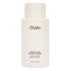 OUAI bottle front packaging showing brand and size, highlights clean look