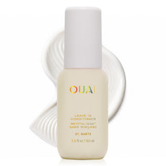 OUAI travel bottle front view showing compact design and label benefit