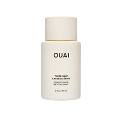 OUAI front view of 32 ounce conditioner bottle showing packaging and benefit of long-lasting supply
