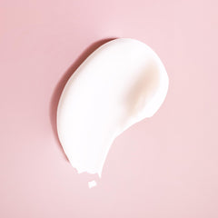 Ouidad conditioner creamy texture close-up illustrating slip and hydration