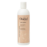 Ouidad front packaging showing bottle and logo for clear product identification and trust