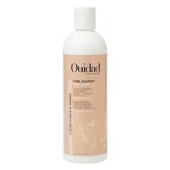 Ouidad front packaging showing bottle and logo for clear product identification and trust
