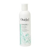 OUIDAD bottle front view showing product and strong hold benefit