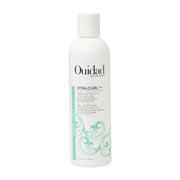 OUIDAD bottle front view showing product and strong hold benefit