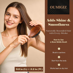 Oumigiz brush in hand to show scale and ergonomic comfort while styling