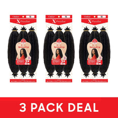 Outre 16-inch twists next to hand showing length and volume benefit