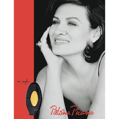 Paloma Picasso bottle close-up highlighting cap and glass texture for elegant detail