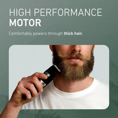 Panasonic trimmer in hand demonstrating compact size and ergonomic control
