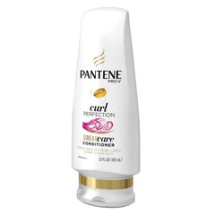 Pantene Curl Perfection 12 oz bottle next to a hand to show scale and easy handling