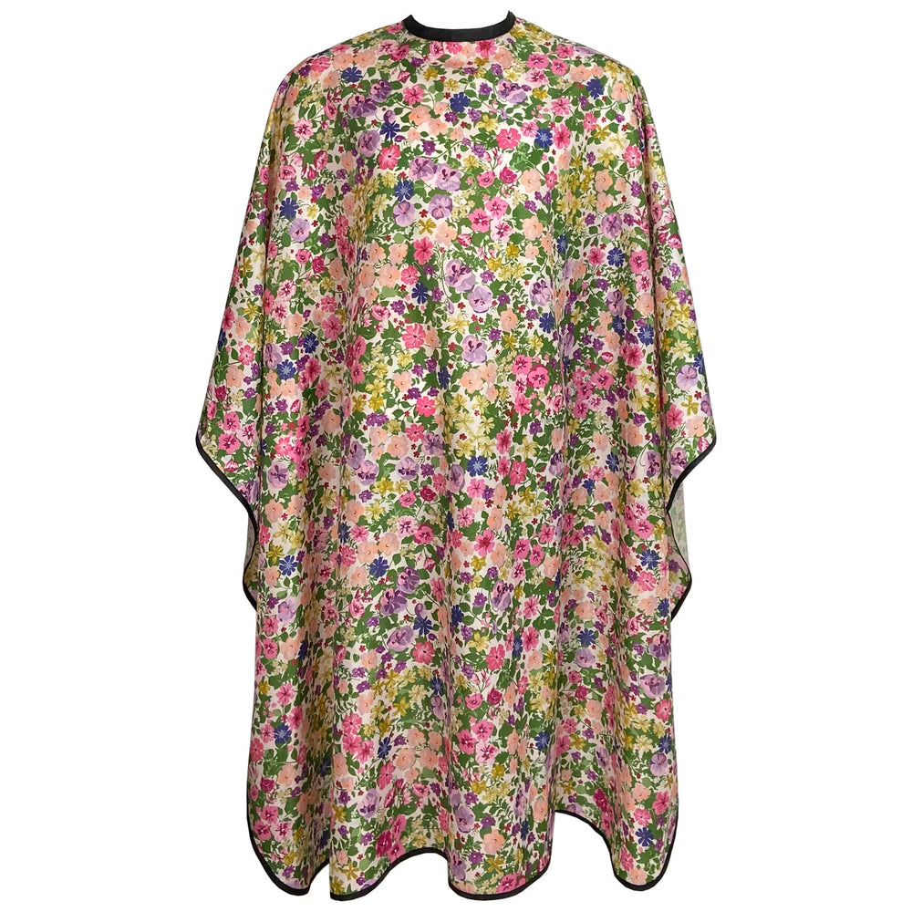 Pelocapa front view of floral cape showing full pattern and neat finish benefit: professional appearance