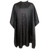 Pelocapa front view showing full coverage and black patterned design, protecting clothing
