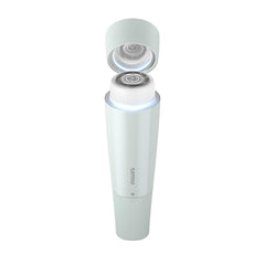 Philips Beauty held in hand to show compact size and travel-friendly portability
