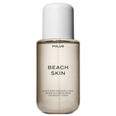 PHLUR front bottle view showing sleek packaging and beachy scent benefits