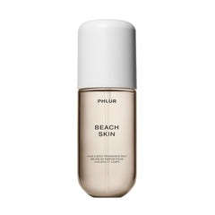 PHLUR front bottle shot showing sleek mist and beachy design, ideal for travel