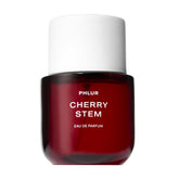 PHLUR front bottle view showing sleek glass and label, highlights premium design