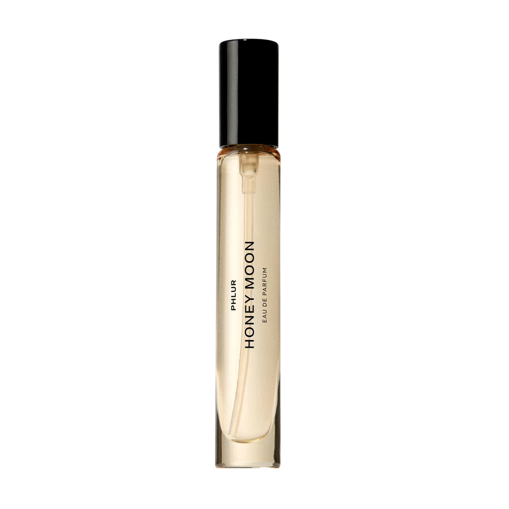PHLUR bottle front view showing compact 9.5 mL size and elegant design, perfect for travel